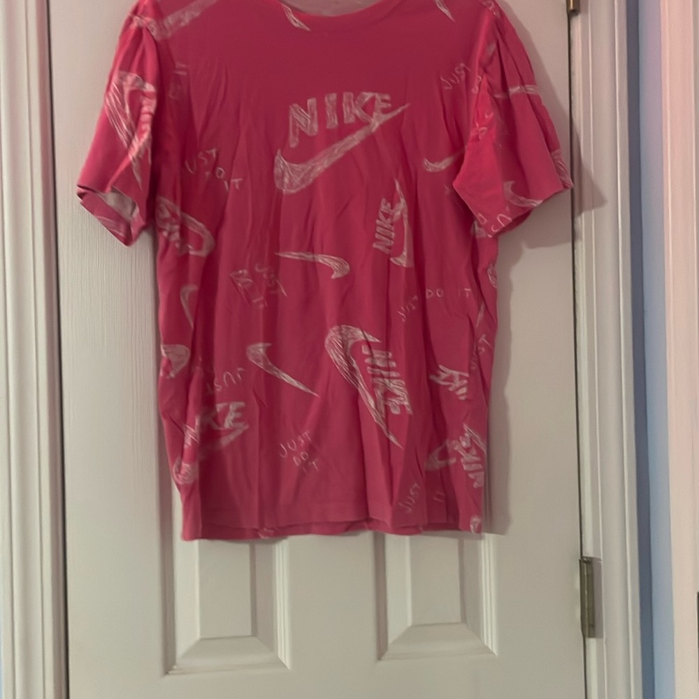 Nike shirt has one small one in the back but it’s not noticeable.